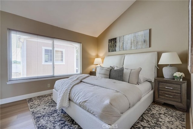 24482 Chrisanta Dr, Mission Viejo, CA 92691 - bedroom featuring wood finished floors and lofted ceiling