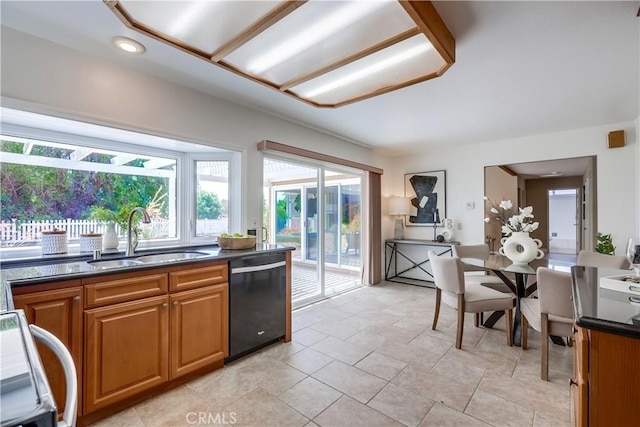 24482 Chrisanta Dr, Mission Viejo, CA 92691 - kitchen with dishwasher, range, dark countertops, and brown cabinets