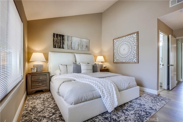 24482 Chrisanta Dr, Mission Viejo, CA 92691 - bedroom featuring lofted ceiling and wood finished floors