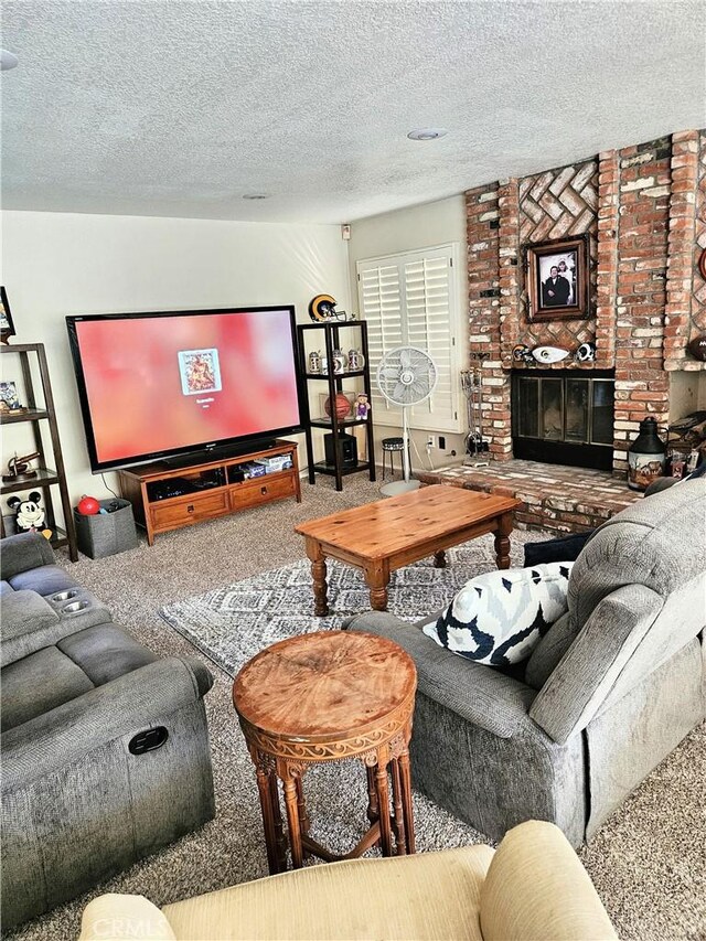 10771 Orchard View Ln, Riverside, CA 92503 - living room featuring carpet floors, a textured ceiling, and a fireplace