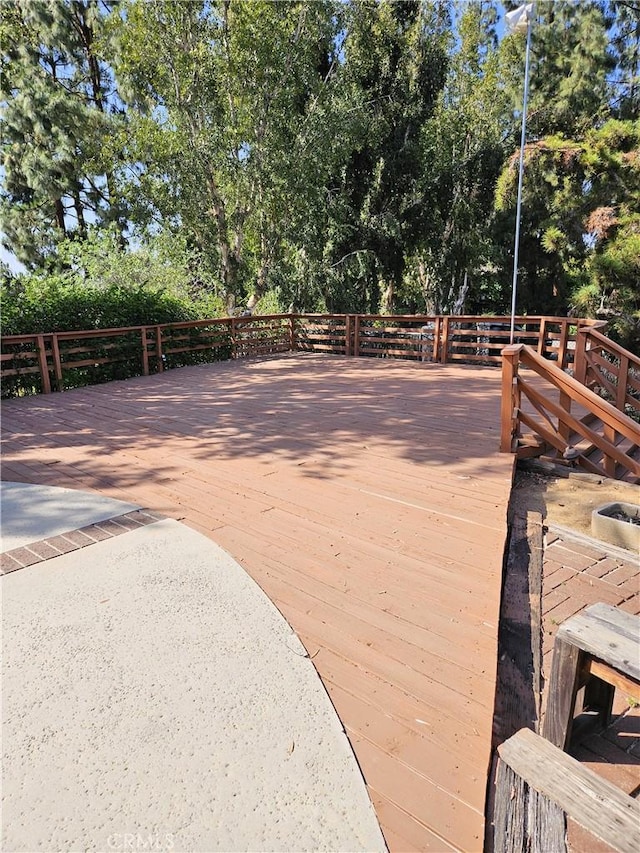 10771 Orchard View Ln, Riverside, CA 92503 - wooden terrace with view of wooded area