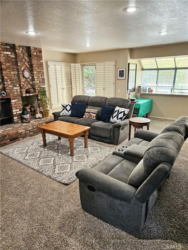 10771 Orchard View Ln, Riverside, CA 92503 - living room with carpet flooring, a textured ceiling, plenty of natural light, and recessed lighting