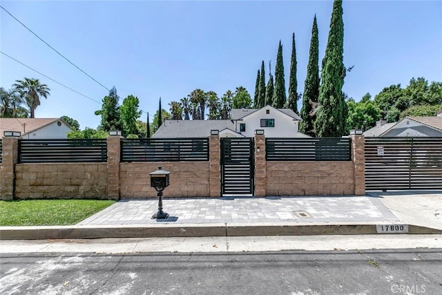 17800 Raymer St, Sherwood Forest, CA 91325 - view of front of house with a fenced front yard and a gate