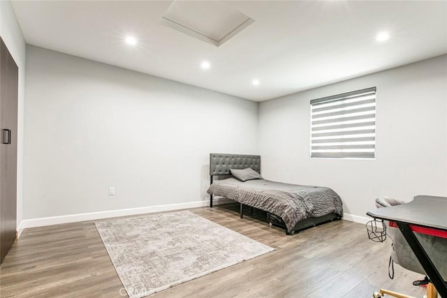 17800 Raymer St, Sherwood Forest, CA 91325 - bedroom with attic access, wood finished floors, and recessed lighting
