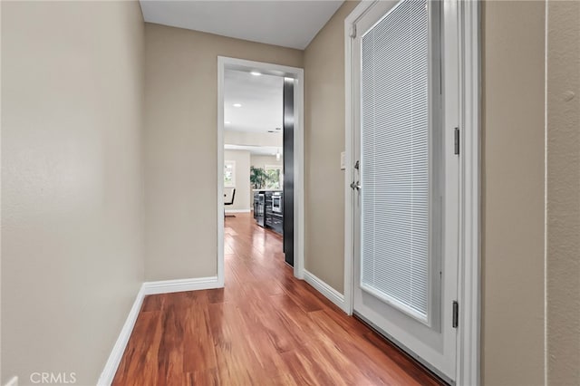 1523 Freeman St, Santa Ana, CA 92706 - corridor with wood finished floors and baseboards