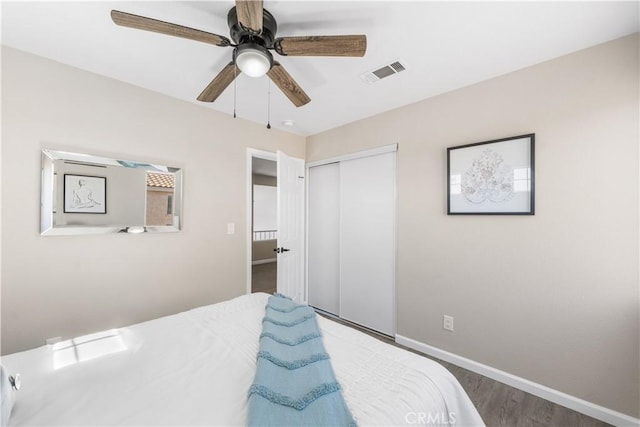 37921 Tackstem St, Palmdale, CA 93552 - bedroom with a closet, wood finished floors, and a ceiling fan