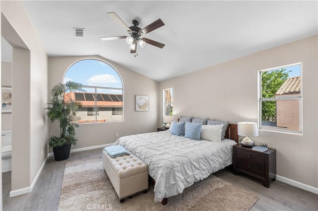 37921 Tackstem St, Palmdale, CA 93552 - bedroom featuring wood finished floors, vaulted ceiling, and a ceiling fan