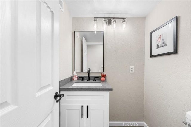 37921 Tackstem St, Palmdale, CA 93552 - bathroom featuring vanity and toilet