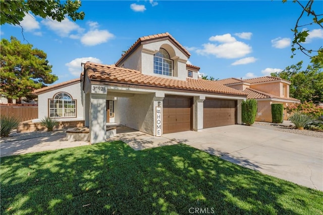 37921 Tackstem St, Palmdale, CA 93552 - mediterranean / spanish-style home with stucco siding, concrete driveway, a tiled roof, and a garage