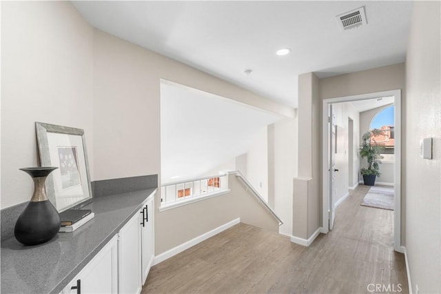 37921 Tackstem St, Palmdale, CA 93552 - corridor featuring light wood-style flooring, an upstairs landing, and recessed lighting