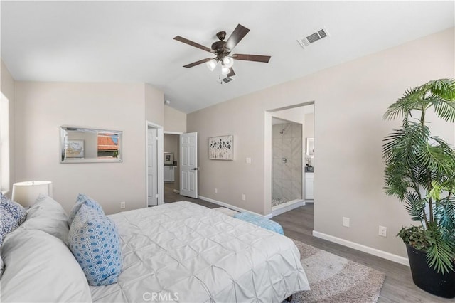 37921 Tackstem St, Palmdale, CA 93552 - bedroom with wood finished floors, vaulted ceiling, a ceiling fan, and ensuite bath