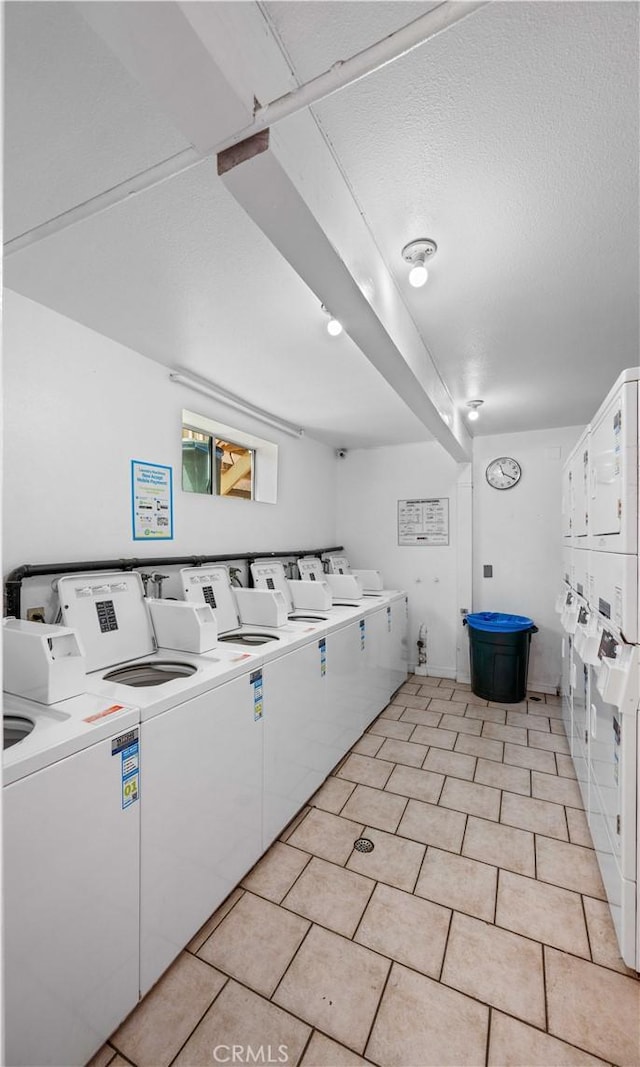 7924 Woodman Ave Unit 20, Panorama City, CA 91402 - shared laundry room with stacked washer / drying machine and washing machine and clothes dryer