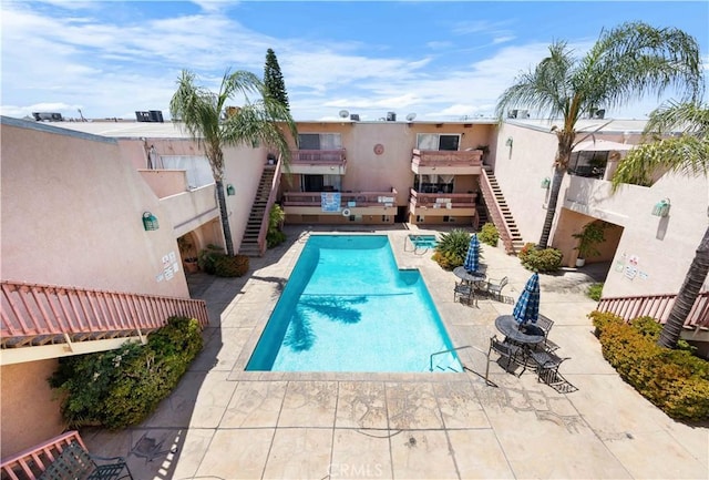 7924 Woodman Ave Unit 20, Panorama City, CA 91402 - community pool featuring a patio and stairway