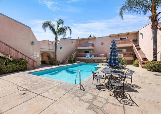 7924 Woodman Ave Unit 20, Panorama City, CA 91402 - community pool with stairway and a patio area