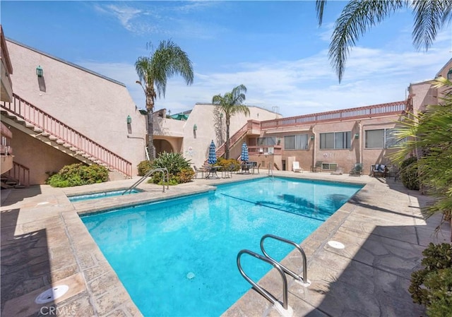 7924 Woodman Ave Unit 20, Panorama City, CA 91402 - community pool featuring stairs and a patio