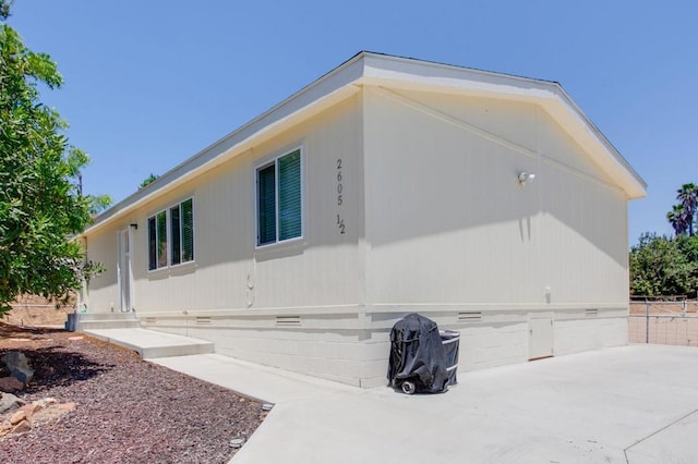 2605 Kauana Loa Dr, Escondido, CA 92029 - view of home's exterior with crawl space and a patio area