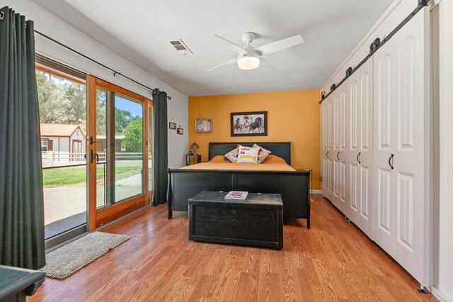 2605 Kauana Loa Dr, Escondido, CA 92029 - bedroom featuring access to outside, light wood finished floors, and ceiling fan