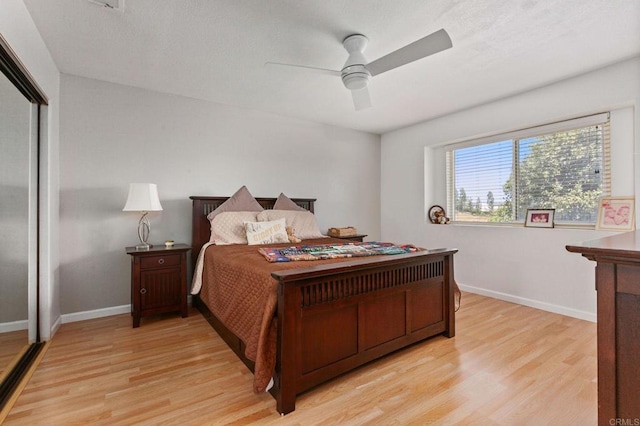 2605 Kauana Loa Dr, Escondido, CA 92029 - bedroom with light wood-type flooring, ceiling fan, and a closet