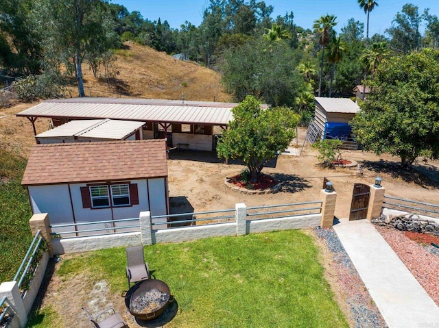 2605 Kauana Loa Dr, Escondido, CA 92029 - view of front of property with an outdoor structure, stucco siding, and roof with shingles
