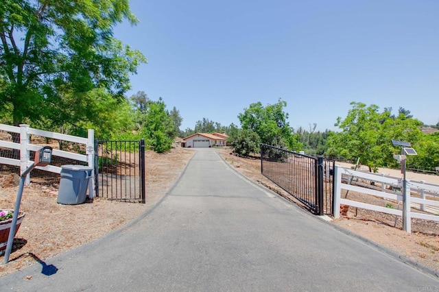 2605 Kauana Loa Dr, Escondido, CA 92029 - view of asphalt driveway with a gate and a gated entry