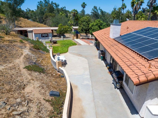 2605 Kauana Loa Dr, Escondido, CA 92029 - exterior view of a tile roof and a chimney