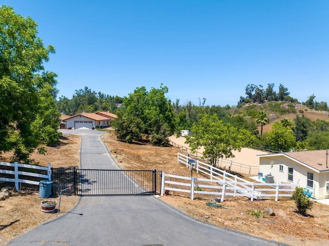 2605 Kauana Loa Dr, Escondido, CA 92029 - view of front of property with a gate and a garage