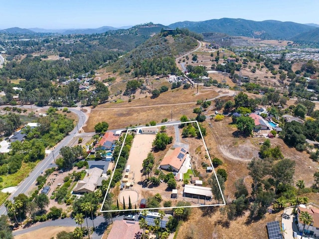 2605 Kauana Loa Dr, Escondido, CA 92029 - aerial view of property's location featuring a mountainous background and property parcel outlined