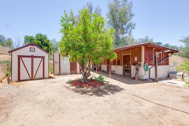 2605 Kauana Loa Dr, Escondido, CA 92029 - view of front of home with an outdoor structure and an exterior structure