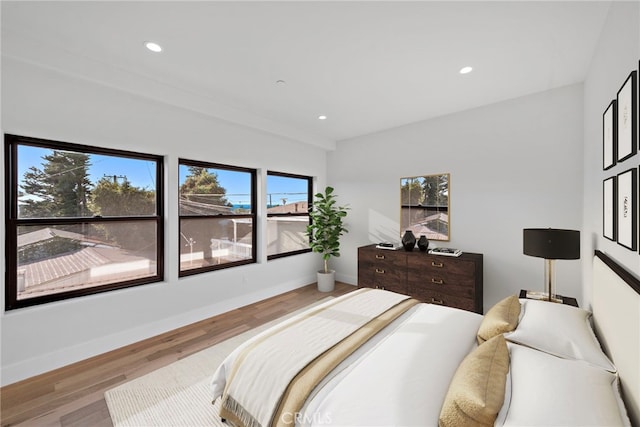 214 W Mariposa Unit B, San Clemente, CA 92672 - bedroom featuring wood finished floors and recessed lighting
