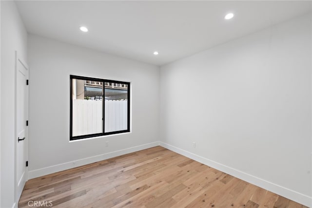 214 W Mariposa Unit B, San Clemente, CA 92672 - empty room with light wood-style flooring and recessed lighting
