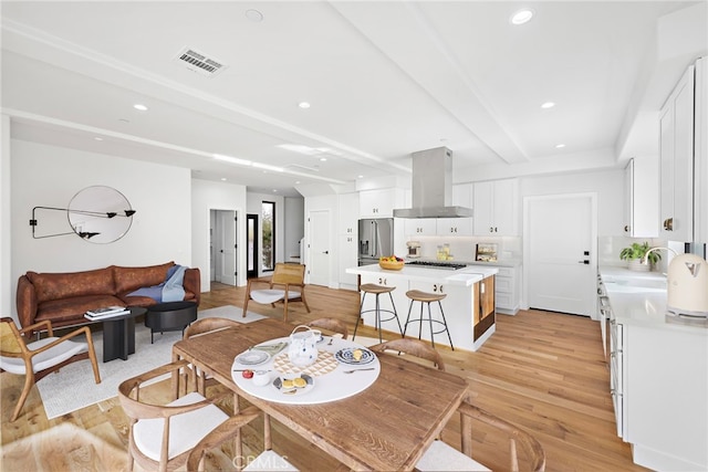 214 W Mariposa Unit B, San Clemente, CA 92672 - dining room featuring light wood-type flooring, beamed ceiling, and recessed lighting