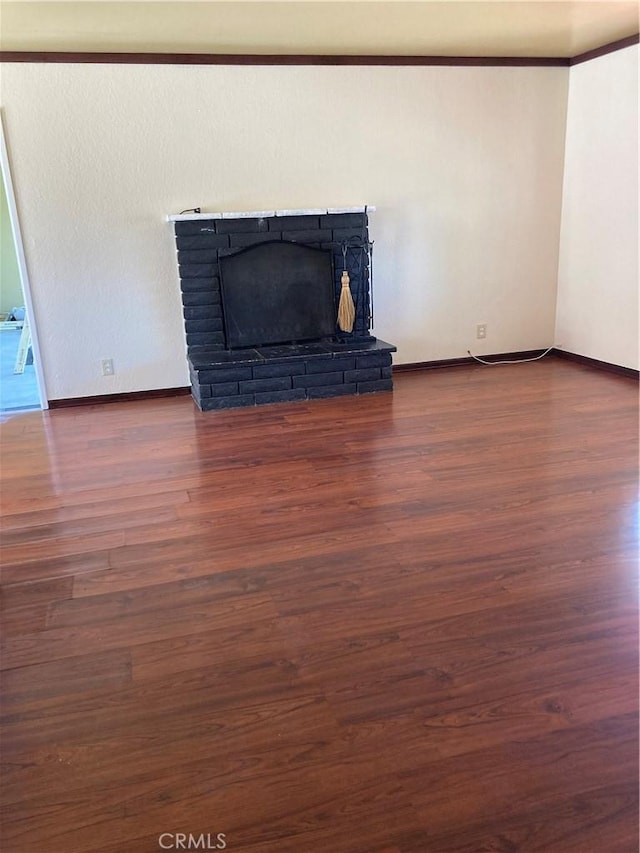 16840 Mackennas Gold Ave, Lake Los Angeles, CA 93591 - detailed view of wood finished floors and a fireplace