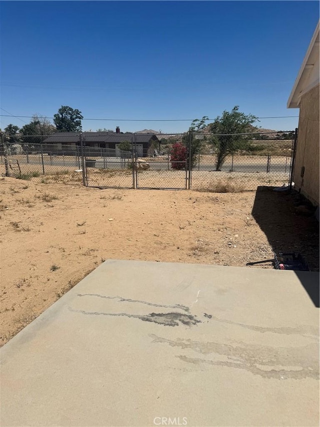 16840 Mackennas Gold Ave, Lake Los Angeles, CA 93591 - view of yard featuring a patio area