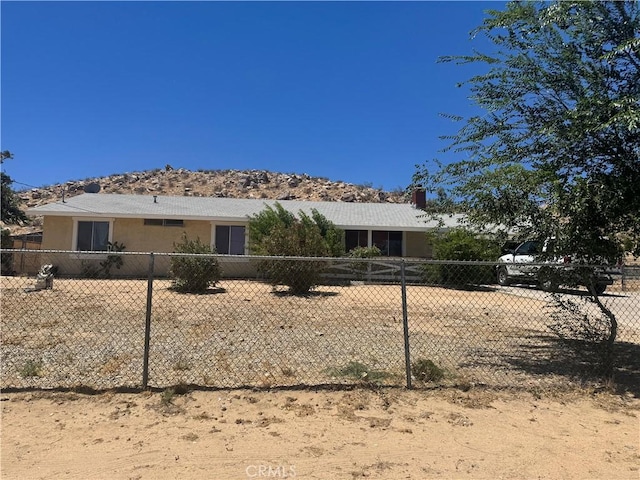 16840 Mackennas Gold Ave, Lake Los Angeles, CA 93591 - single story home featuring a chimney and stucco siding