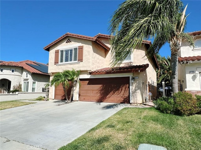 4717 Torrey Pines Dr, Chino Hills, CA 91709 - mediterranean / spanish home featuring stucco siding, an attached garage, a tile roof, and driveway