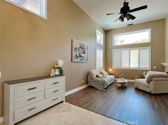 4717 Torrey Pines Dr, Chino Hills, CA 91709 - sitting room with a ceiling fan, a towering ceiling, and light tile patterned floors