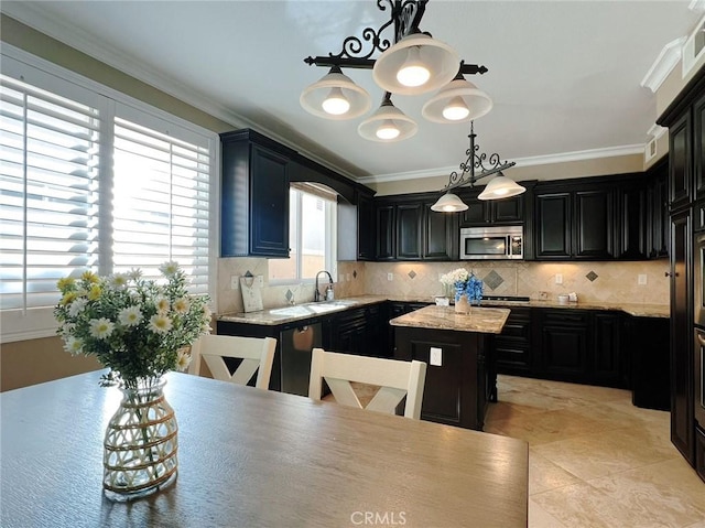 4717 Torrey Pines Dr, Chino Hills, CA 91709 - kitchen with stainless steel microwave, dishwashing machine, dark cabinets, a kitchen island, and crown molding