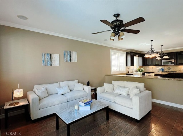 4717 Torrey Pines Dr, Chino Hills, CA 91709 - living area featuring dark wood finished floors, ceiling fan, and crown molding