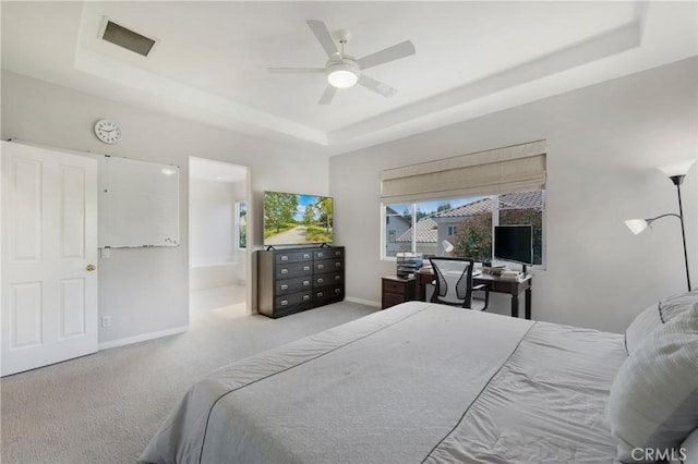 3 Heatherwood, Irvine, CA 92620 - carpeted bedroom with a tray ceiling, ensuite bath, and ceiling fan