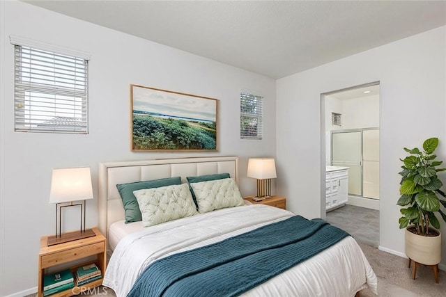 27569 Viridian St Unit 1, Murrieta, CA 92562 - carpeted bedroom featuring ensuite bath and baseboards
