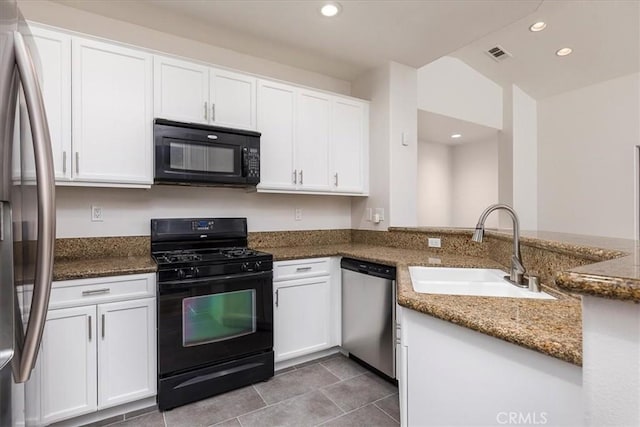 27569 Viridian St Unit 1, Murrieta, CA 92562 - kitchen featuring black appliances, recessed lighting, white cabinetry, dark stone counters, and light tile patterned floors