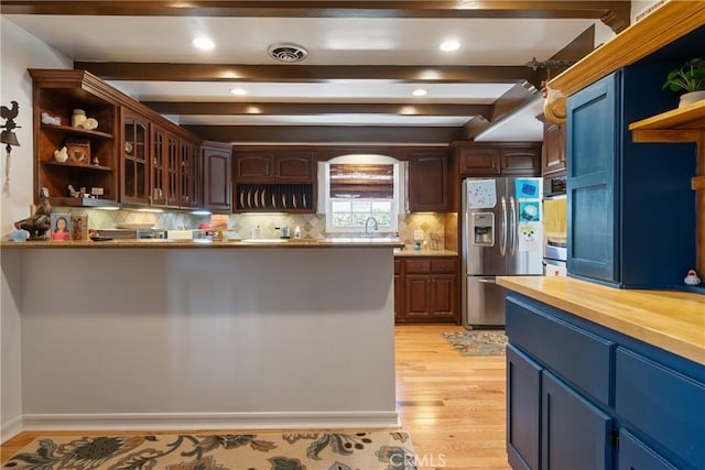 469 N Nearglen Ave, Covina, CA 91724 - kitchen with appliances with stainless steel finishes, open shelves, light wood-style floors, beam ceiling, and decorative backsplash