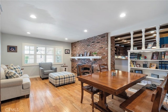 469 N Nearglen Ave, Covina, CA 91724 - dining room with hardwood / wood-style floors, a fireplace, and recessed lighting