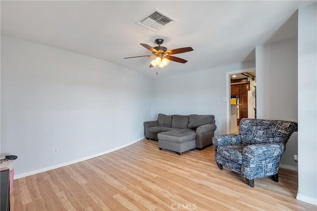 469 N Nearglen Ave, Covina, CA 91724 - living room with light wood-type flooring and a ceiling fan