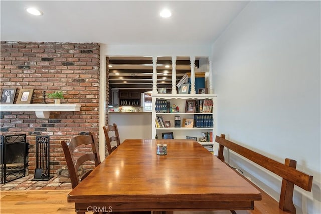 469 N Nearglen Ave, Covina, CA 91724 - dining space featuring wood finished floors, recessed lighting, and a fireplace