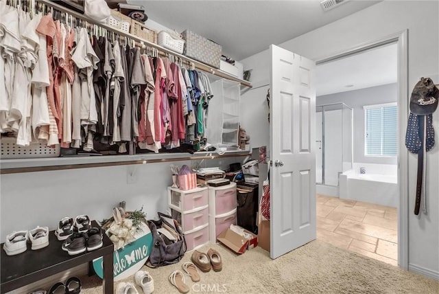 24934 Pine Creek Loop, Corona, CA 92883 - walk in closet with stone tile flooring
