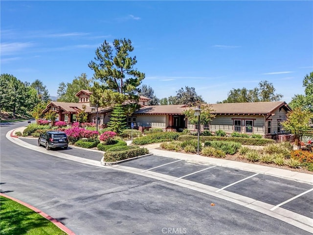 24934 Pine Creek Loop, Corona, CA 92883 - view of front facade featuring uncovered parking