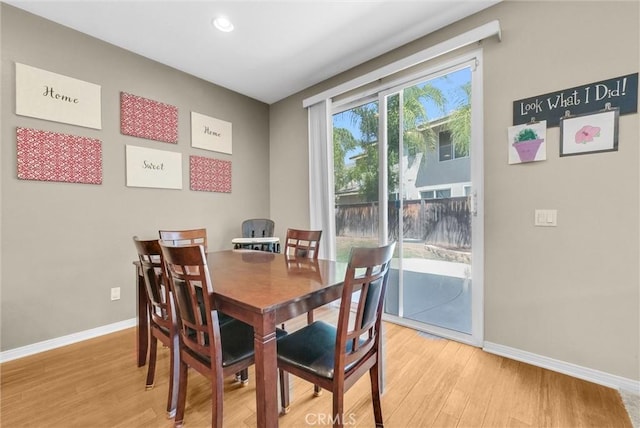 24934 Pine Creek Loop, Corona, CA 92883 - dining room featuring light wood finished floors and recessed lighting