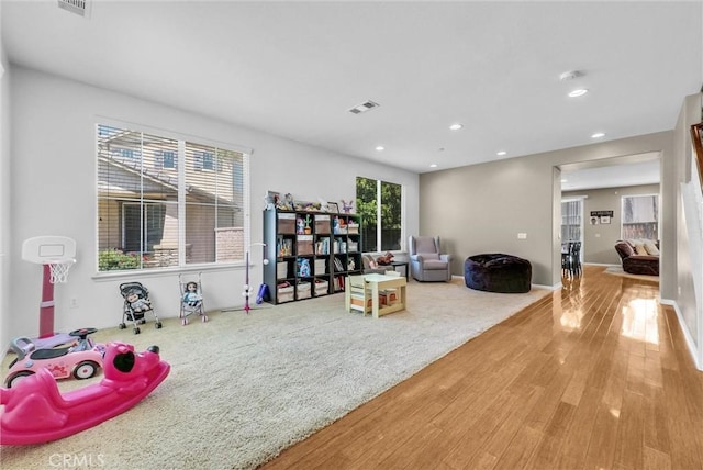 24934 Pine Creek Loop, Corona, CA 92883 - playroom featuring wood finished floors and recessed lighting