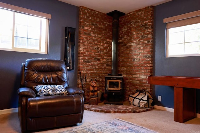 16320 Dartolo Rd, Ramona, CA 92065 - sitting room with a wood stove and carpet flooring